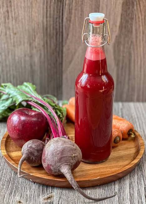 beat root, ginger and carrots juice beat root, ginger and carrots juice